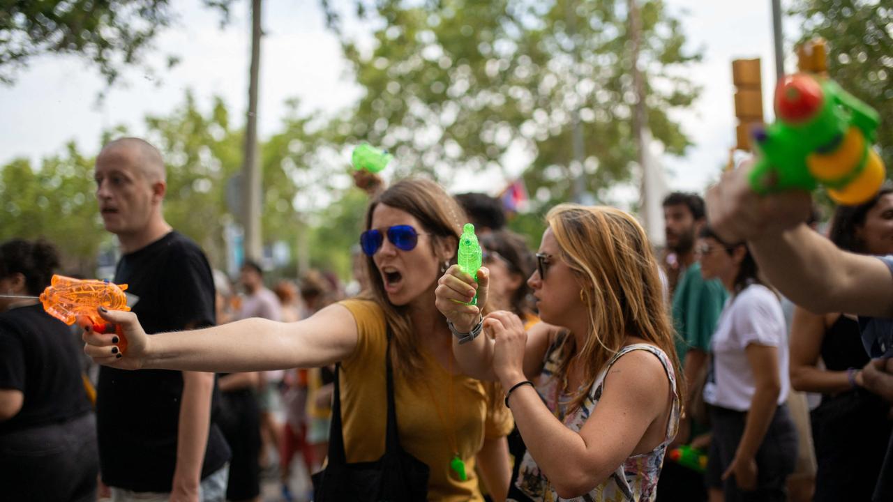 Two women during a demonstration against mass tourism. Picture: Lorena Sopena/Europa Press/ABACAPRESS.COM/AAP