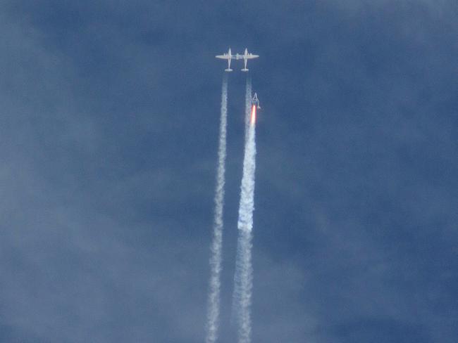 Before the disaster ... The Virgin Galactic SpaceShipTwo rocket separates from its carrier aircraft. Picture: AP Photo/Kenneth Brown