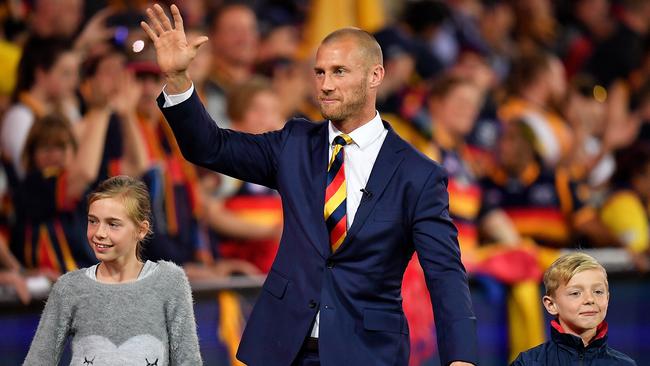 Retiring Crow Scott Thompson, joined by children Ava and Harry says goodbye to his home crowd.