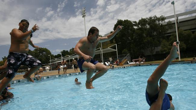 Swimmers retreat to the popular pools as temperatures reached 40C on January 23, 2010. Picture: Krystle Wright