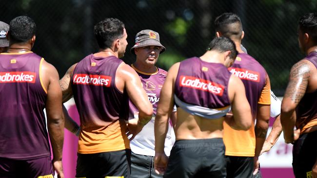 Coach Anthony Seibold chats to his players during a Brisbane Broncos training session ahead of the round one match against the Storm. Picture: Bradley Kanaris/Getty Images