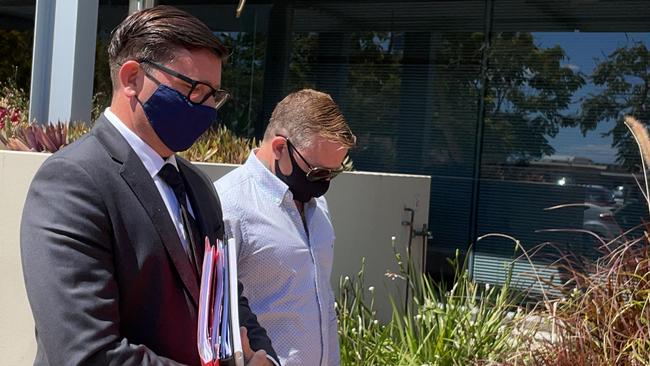 Mitchell Anthony Ralston (right) leaves Southport Court with his lawyer Michael Gatenby, of Gatenby Criminal Lawyers. Picture: Lea Emery