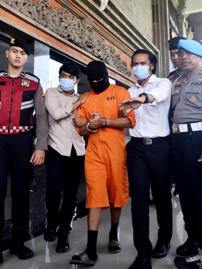 Lamar Ahchee was escorted by Bali Police on Monday. Picture: Lukman S. Bintoro