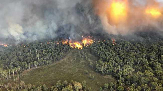 PREPARE FOR THE WORST: Emergency services captured this aerial view of a fire burning near Wallangarra during an earlier bushfire season. Picture: QFES