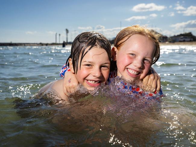 MELBOURNE, DECEMBER 12, 2024: Best and Worst Beaches 2024 - Williamstown Beach. Finn, 7, and Olive, 5, cool off at Williamstown Beach. Picture: Mark Stewart