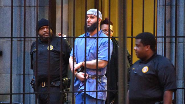 Officials escort ‘Serial’ podcast subject Adnan Syed from the courthouse in 2016. Picture: Karl Merton Ferron/Baltimore Sun/TNS via Getty Images