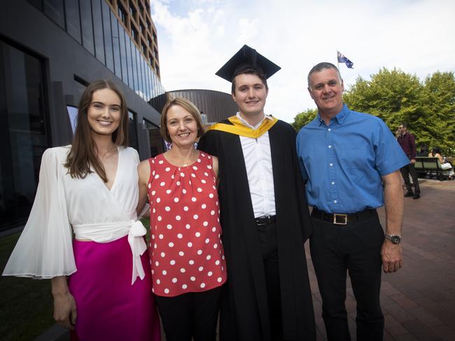 Pharmacy graduate Jonty Killick and family at UTAS graduations held at the Hobart Grand Chancellor. Picture: LUKE BOWDEN