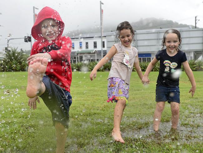 Harry Balmabes, 4, Bessie Smith, 4 and Willow Balmabes, 4. About 100mm of rain has been dumped on Townsville in the past 24 hours causing minor flood warnings to be issued. PICTURE: MATT TAYLOR.