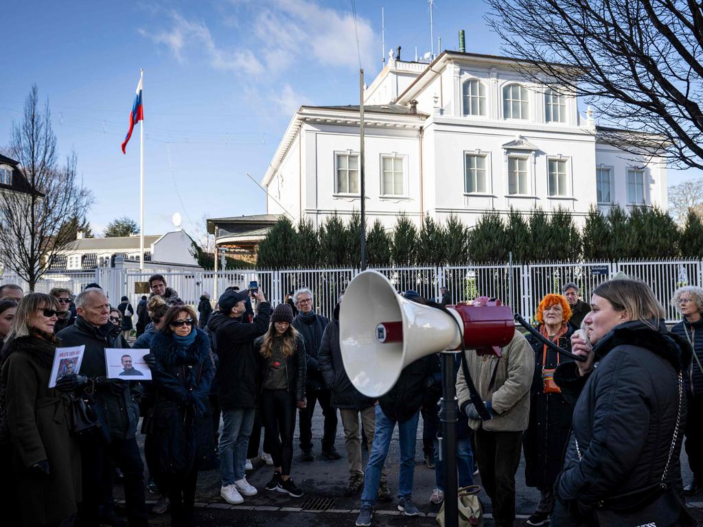 People demonstrate in front of the Russian embassy in Copenhagen, one day after Russian officials announced the death of the Kremlin's most prominent critic Alexei Navalny.