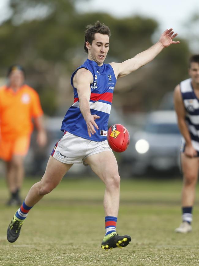 Bryce Dinger takes a kick.