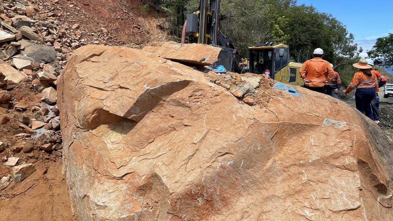 A giant problem: the boulder blocking the Captain Cook Highway north of Rex Lookout. Picture: TMR