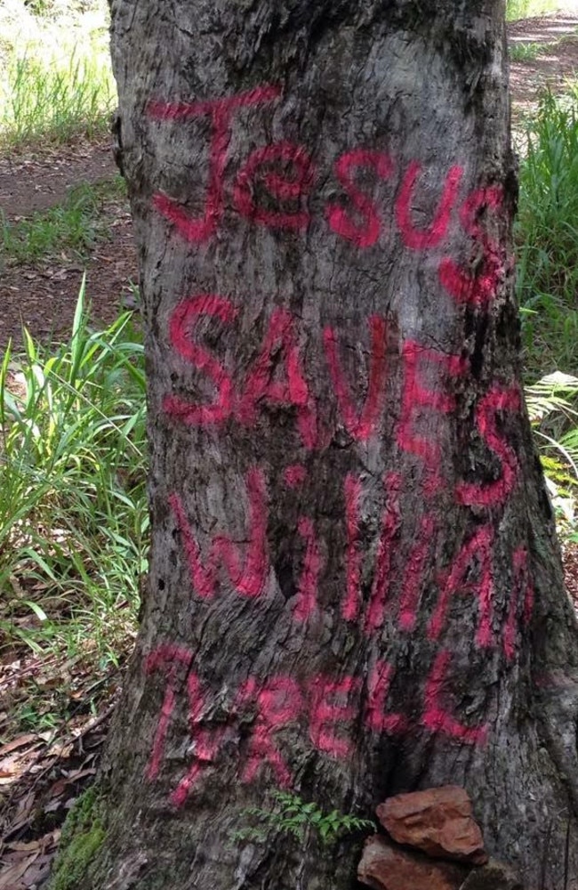 Creepy: The message on a tree trunk.