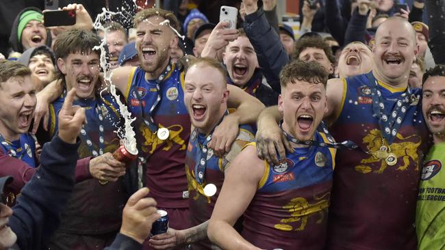 South Morang players celebrate the NFNL Division 2 premiership. Picture: Andrew Batsch