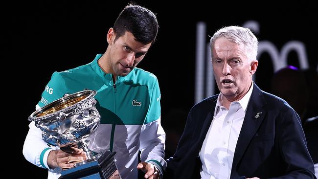 Djokovic speaks with Tennis Australia CEO Craig Tiley after claiming the 2021 Australian Open. Picture: Getty