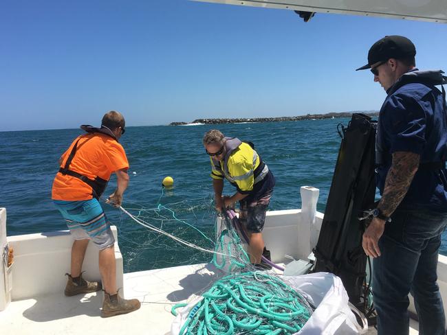 NSWDPI team setting Shark nets of NSW beaches this week.