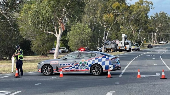 Police blocking off roads as a siege in Logan Reserve on Thursday. Picture: Steve Pohlner