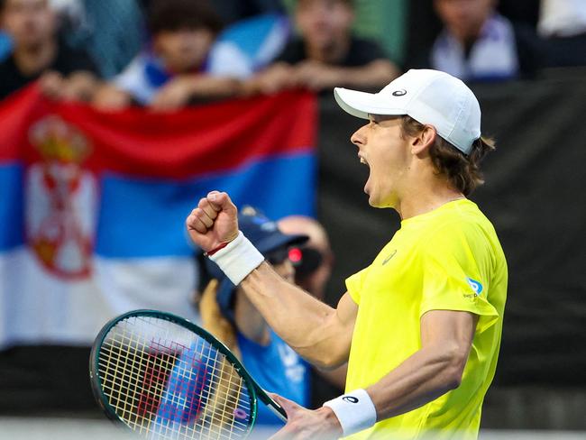 Australia's Alex de Minaur celebrates winning his men's singles match against Serbia's Novak Djokovic at the United Cup tennis tournament in Perth on January 3, 2024. (Photo by COLIN MURTY / AFP) / -- IMAGE RESTRICTED TO EDITORIAL USE - STRICTLY NO COMMERCIAL USE --