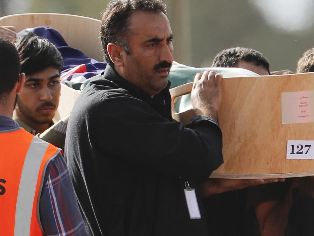 Mourners carry the body of a victim of the March 15 mosque shootings for a burial at the Memorial Park Cemetery in Christchurch, New Zealand. Picture: AP