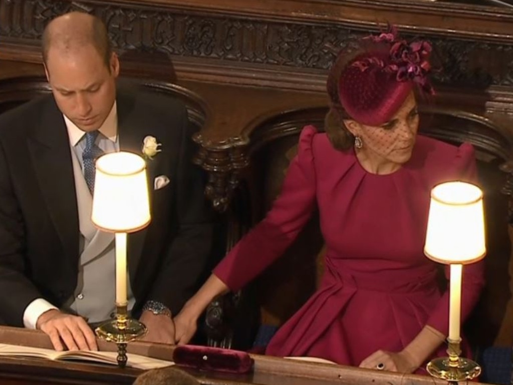 Kate and William holding hands at Princess Eugenie’s wedding.