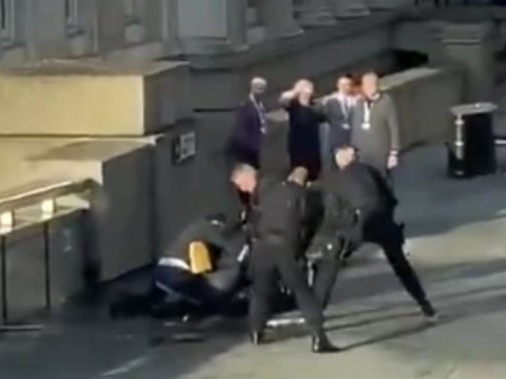 Bystanders held the man down until police could get to him. Picture: Twitter