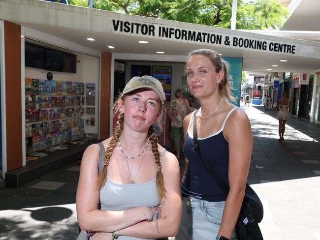 The Surfers Paradise tourist information booth in Cavill Ave Mall is being closed and its staff made redundant by council and Experience Gold Coast. Scottish tourists Rachel Rutherford and Aimee Collins think its a bad idea. Picture Glenn Hampson