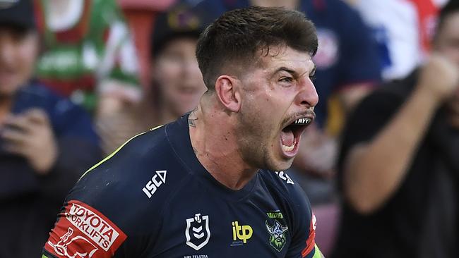 BRISBANE, AUSTRALIA - MAY 15: Curtis Scott of the Raiders celebrates with team mates after scoring a try during the round 10 NRL match between the Canterbury Bulldogs and the Canberra Raiders at Suncorp Stadium, on May 15, 2021, in Brisbane, Australia. (Photo by Albert Perez/Getty Images)