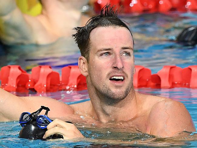 James Magnussen looks on after swimming in the Mens 100m Freestyle Final on day 2 of the 2018 Australian Swimming Trials at the Gold Coast Aquatic Centre at Southport on the Gold Coast, Thursday, March 1, 2018. (AAP Image/Dave Hunt) NO ARCHIVING, EDITORIAL USE ONLY