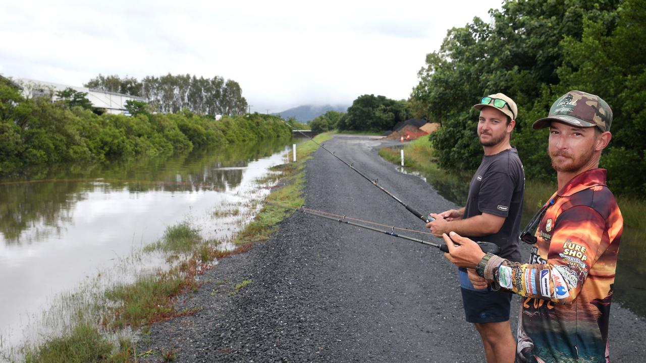 David Moran and Cody Larkin fishing in the Fearnely St channel during the high tide PICTURE: ANNA ROGERS