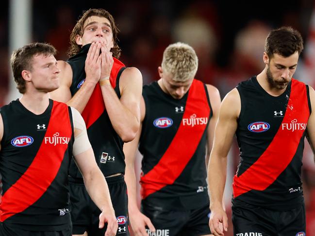 MELBOURNE, AUSTRALIA - AUG 16: Harrison Jones of the Bombers looks dejected after a loss during the 2024 AFL Round 23 match between Essendon Bombers and the Sydney Swans at Marvel Stadium on August 16, 2024 in Melbourne, Australia. (Photo by Dylan Burns/AFL Photos via Getty Images)