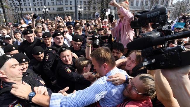 Russian riot police officers detain opposition leader Alexei Navalny during a anti-Putin rally in Moscow, 2018. Picture: AFP