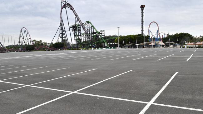 An empty car park is seen at Warner Bros Movie World. Picture: AAP.