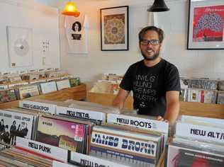 MUSIC HEAVEN: Mark Grounds at his record and coffee shop Wax Buildup in Maroochydore. Picture: Eden Boyd