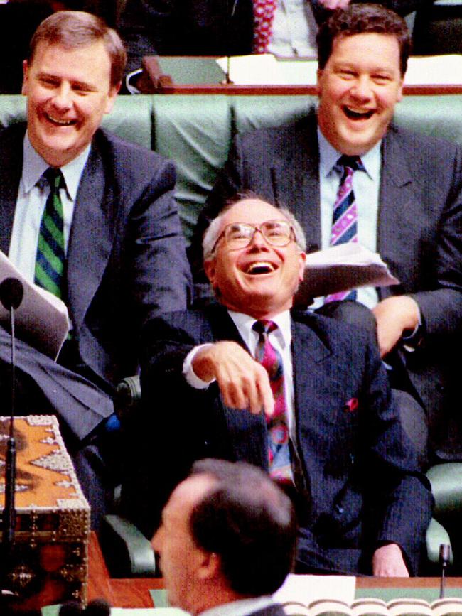 John Howard laughing at a response from Paul Keating.