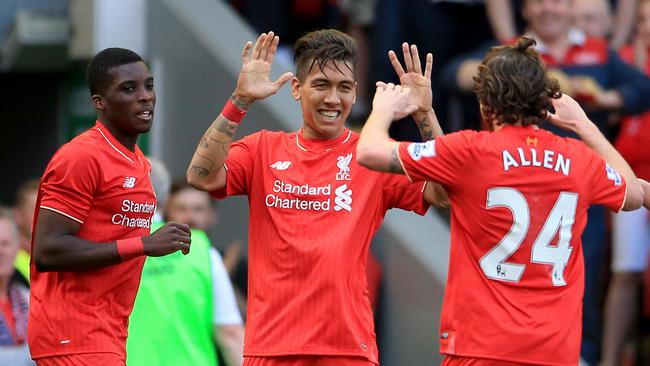 Liverpool's Roberto Firmino celebrates scoring against Watford with teammates Sheyi Ojo and Joe Allen.