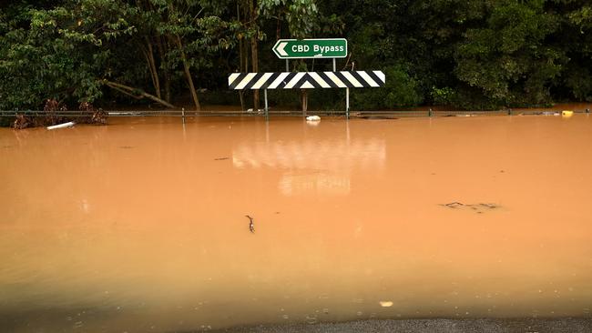 Floodwater inundates a road in Lismore. Evacuation orders have been issued for towns across the NSW Northern Rivers region, with flash flooding expected as heavy rainfall continues. It is the second major flood event for the region this month. Picture: Dan Peled/Getty Images)