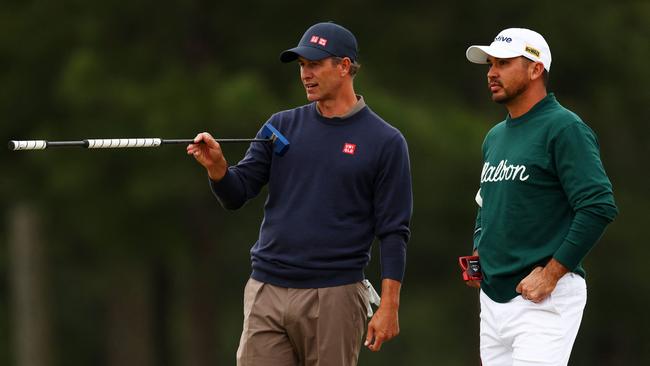 Adam Scott and Jason Day during their practice round.