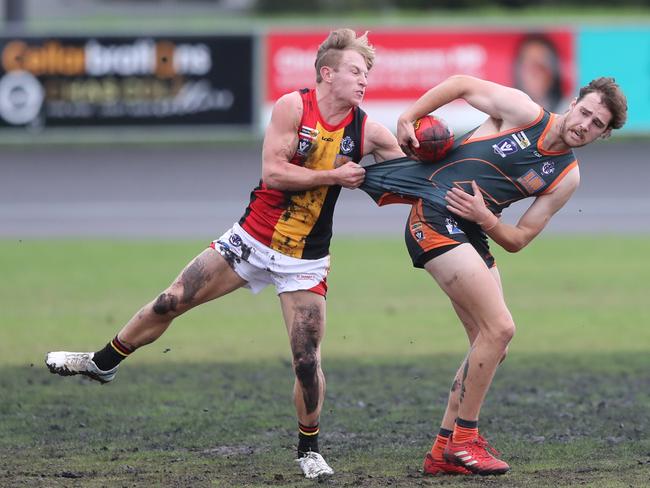 St Josephs Lewis Antonac (1) and Giants Josh Dwyer (32). GFL: Geelong West Giants v St Joseph's senior football at West Oval. Picture: Alan Barber