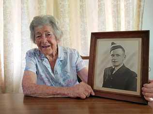 Phyllis Adair holds a picture of her late-brother Sergeant William Edmonds. Picture: Nick Wright