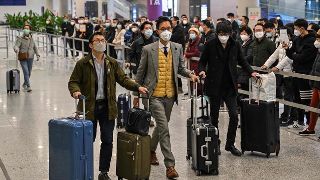 Passengers at Shanghai Pudong International Airport. Picture: AFP