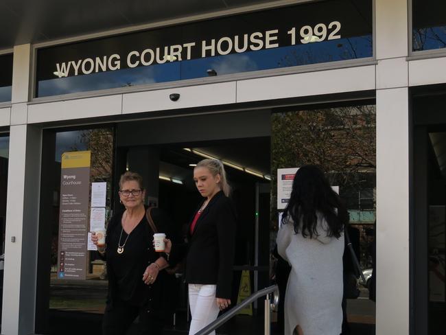 Tahlia O'Grady (white pants), 21, of Wyee, leaves Wyong Local Court after being sentenced to a 20-month Intensive Corrections Order. Picture: Richard Noone