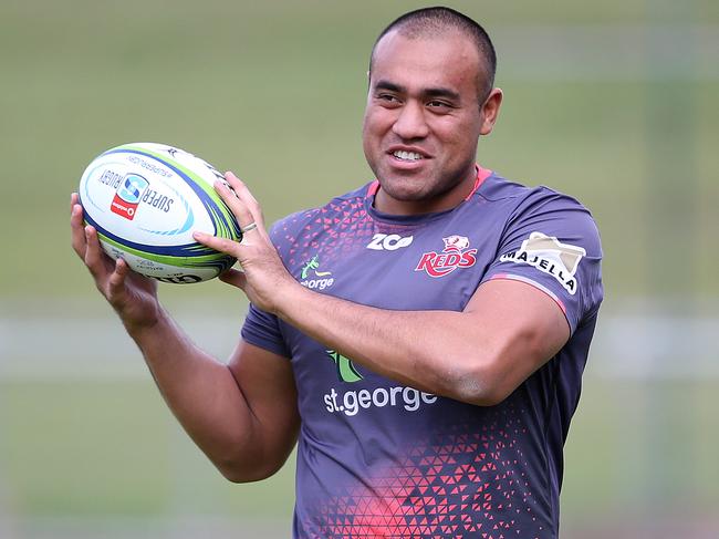 Queensland Reds player Caleb Timu smiles during a team training session at Ballymore in Brisbane Monday, July 2, 2018. (AAP Image/Jono Searle) NO ARCHIVING