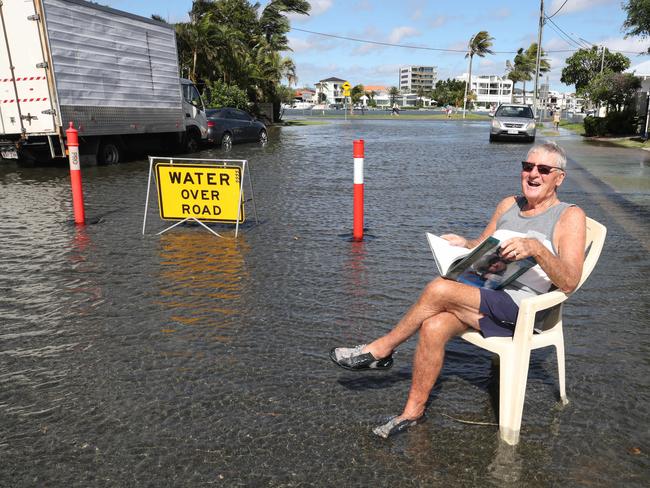 Flooding from the King tide at Budds Beach at Surfers Paradise was made worse by the approaching storm system. Local Bryan King enjoys his new waterfront vista in Palm Ave. (contact no 0402 033355). Picture Glenn Hampson