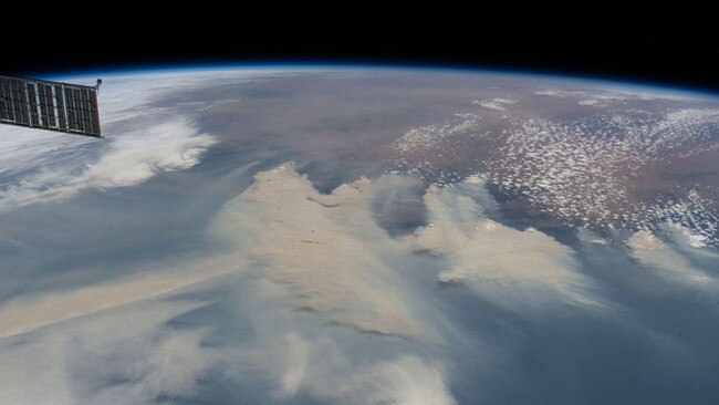 A Jan. 4 photograph taken by astronauts on the International Space Station shows smoke rising from extreme fire activity on the east coast of Australia. Photo: NASA Crew Earth Observations