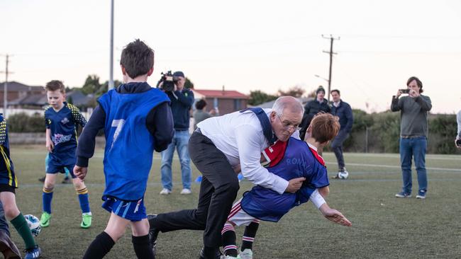 Prime Minister Scott Morrison attends training night at the Devonport Strikers Soccer Club following the recent announcement by Gavin Pearce to upgrade ground facilities if re elected. This event is located in the electorate of BRADDON. Picture: Jason Edwards