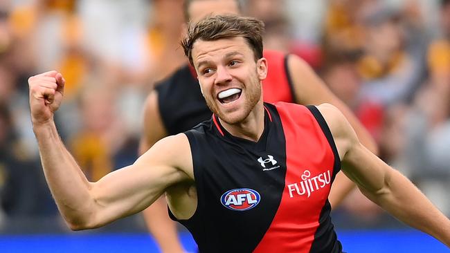 MELBOURNE, AUSTRALIA - MARCH 19: Jordan Ridley of the Bombers celebrates kicking a goal during the round one AFL match between Hawthorn Hawks and Essendon Bombers at Melbourne Cricket Ground, on March 19, 2023, in Melbourne, Australia. (Photo by Quinn Rooney/Getty Images)