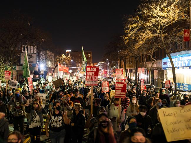 There were chaotic scenes in Minneapolis, Minnesota, as demonstrators blasted President Donald Trump's attempts to halt ballots from being counted. Picture: AFP