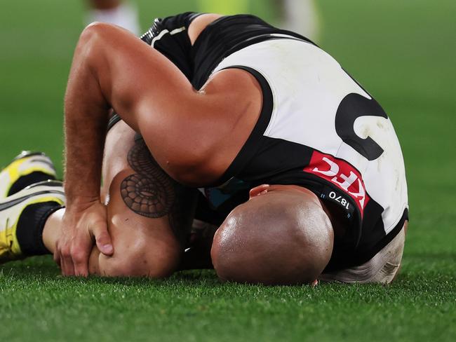 ADELAIDE, AUSTRALIA - APRIL 26: Sam Powell-Pepper of the Power is injures his knee during the 2024 AFL Round 07 match between the Port Adelaide Power and the St Kilda Saints at Adelaide Oval on April 26, 2024 in Adelaide, Australia. (Photo by James Elsby/AFL Photos via Getty Images)