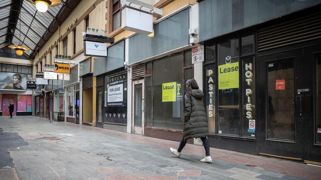 Empty streets ans shuttered shops during Melbourne’s long lockdown. Picture: Jake Nowakowski