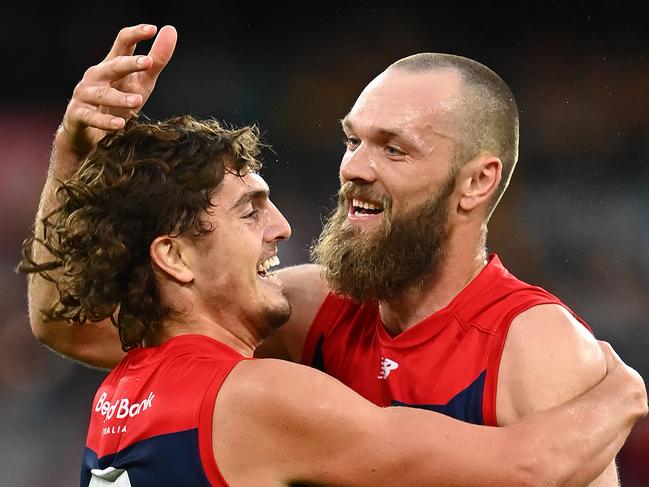 MELBOURNE, AUSTRALIA - APRIL 18: Max Gawn of the Demons is congratulated by Luke Jackson after kicking a goal during the round five AFL match between the Hawthorn Hawks and the Melbourne Demons at Melbourne Cricket Ground on April 18, 2021 in Melbourne, Australia. (Photo by Quinn Rooney/Getty Images)