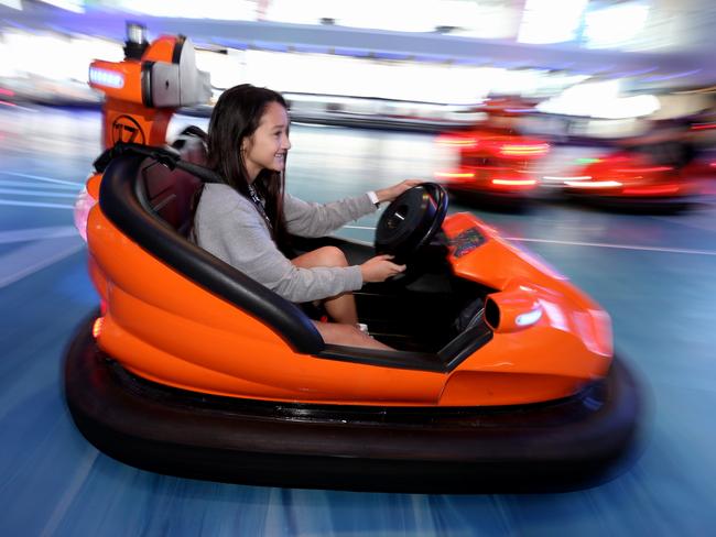 Amy Watson enjoying dodge em cars. Picture: Adam Taylor